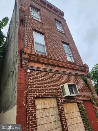 a building view with a brick wall