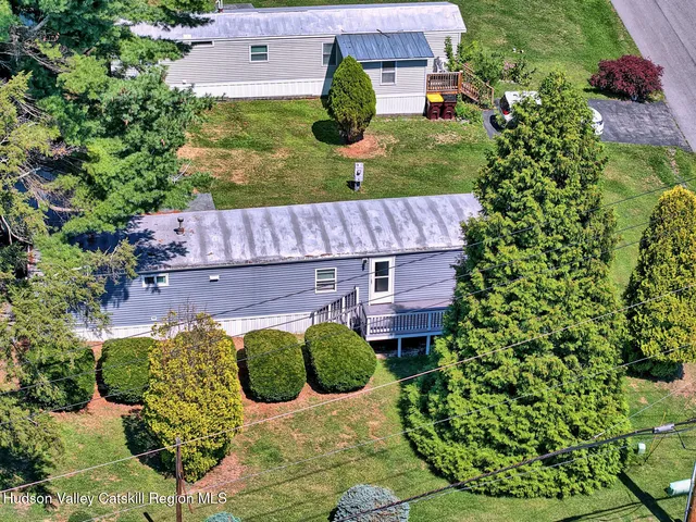 an aerial view of a house with garden