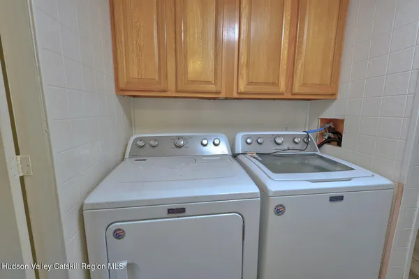 a view of a garden with a house