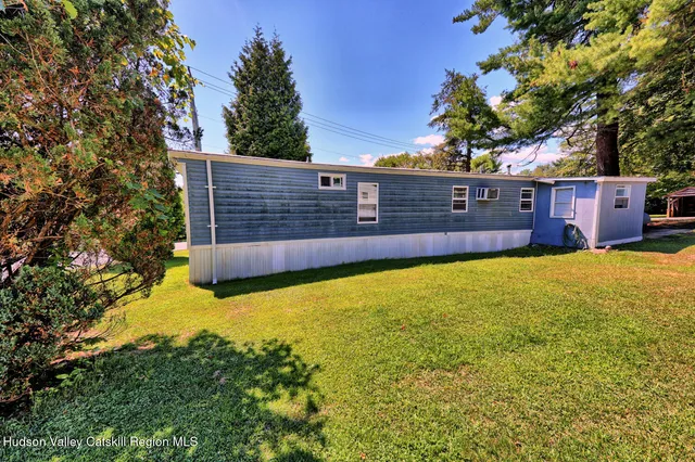 a view of a garden with a patio