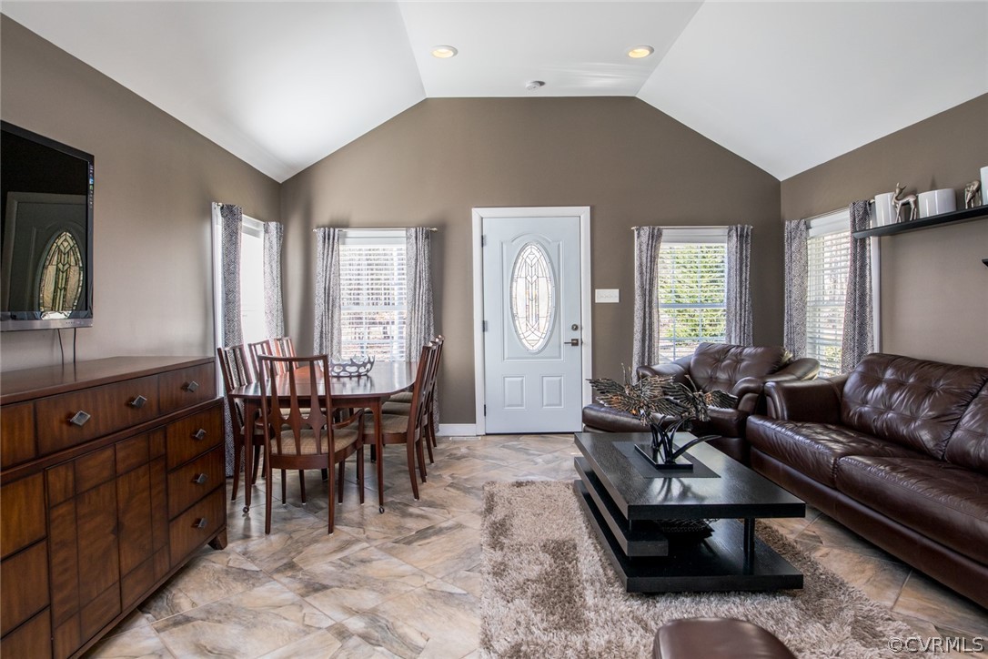 3402 Walkers Ferry Road Midlothian, VA 23112 - Photo 20 of 44 a living room with furniture a dining table and a large window