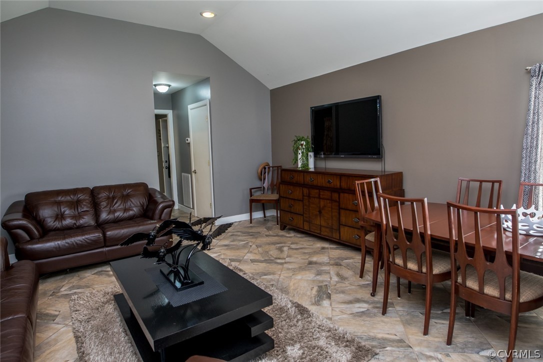 3402 Walkers Ferry Road Midlothian, VA 23112 - Photo 21 of 44 a living room with furniture and a flat screen tv