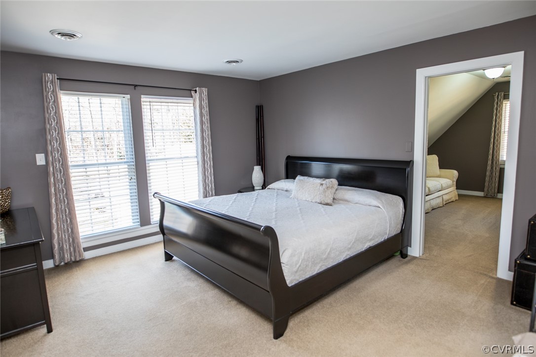 3402 Walkers Ferry Road Midlothian, VA 23112 - Photo 26 of 44 a bedroom with a bed and window