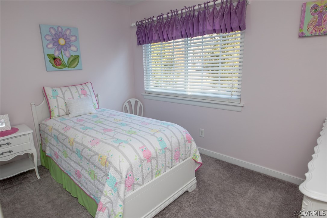 3402 Walkers Ferry Road Midlothian, VA 23112 - Photo 32 of 44 a bedroom with a bed and a window
