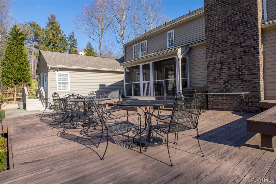 3402 Walkers Ferry Road Midlothian, VA 23112 - Photo 36 of 44 a patio with table and chairs and potted plants