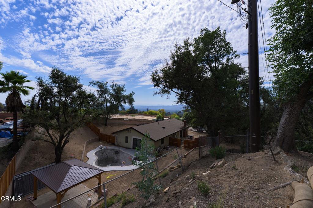 446 Devonwood Road Altadena, CA 91001 - Photo 8 of 13 a backyard of a house with table and chairs