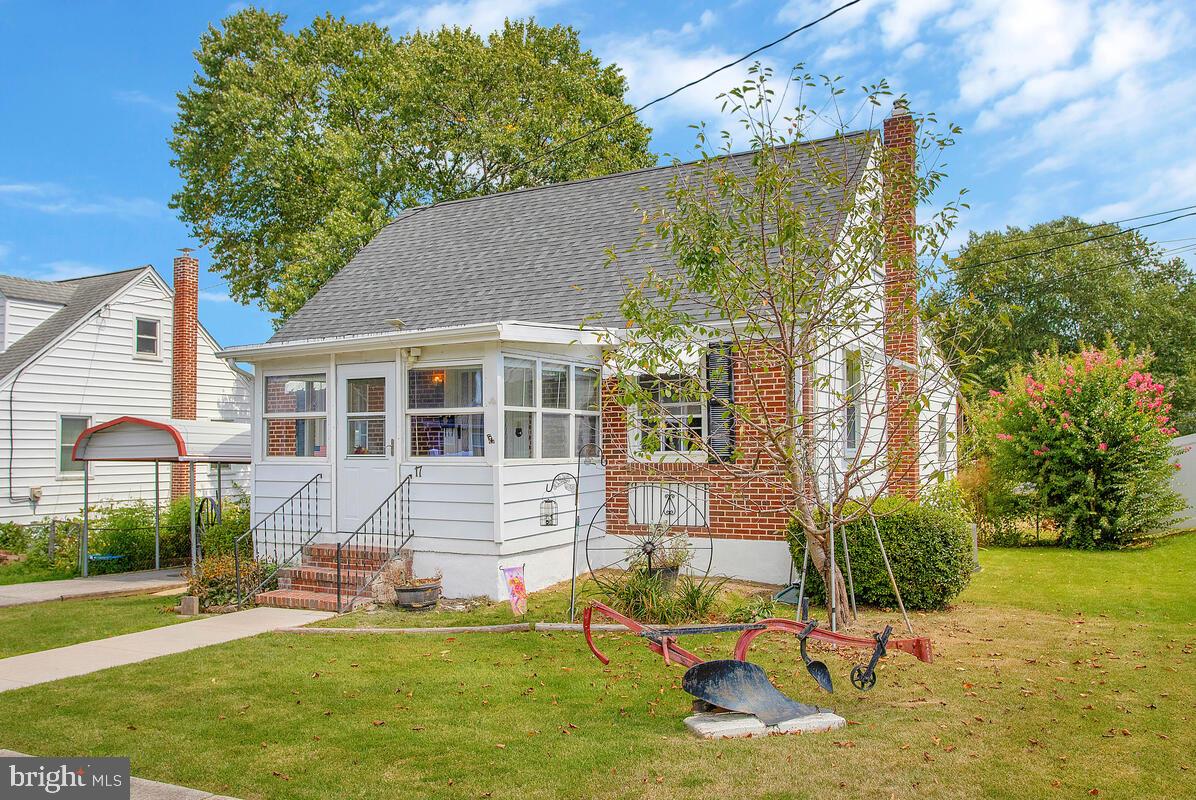 17 Mansion Road Linthicum Heights, MD 21090 - Photo 2 of 42 Enjoy your morning coffee on the enclosed porch.