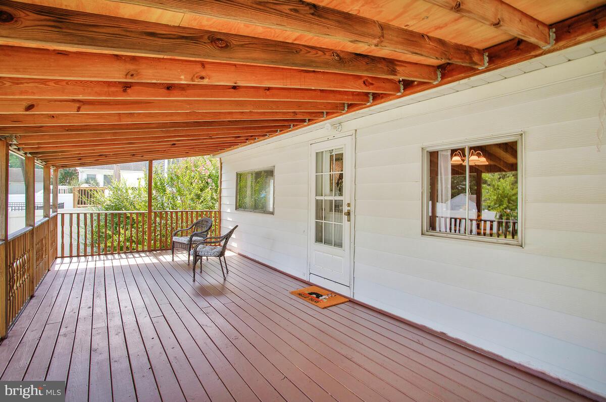 17 Mansion Road Linthicum Heights, MD 21090 - Photo 4 of 42 Huge deck overlooking the large, level back yard.