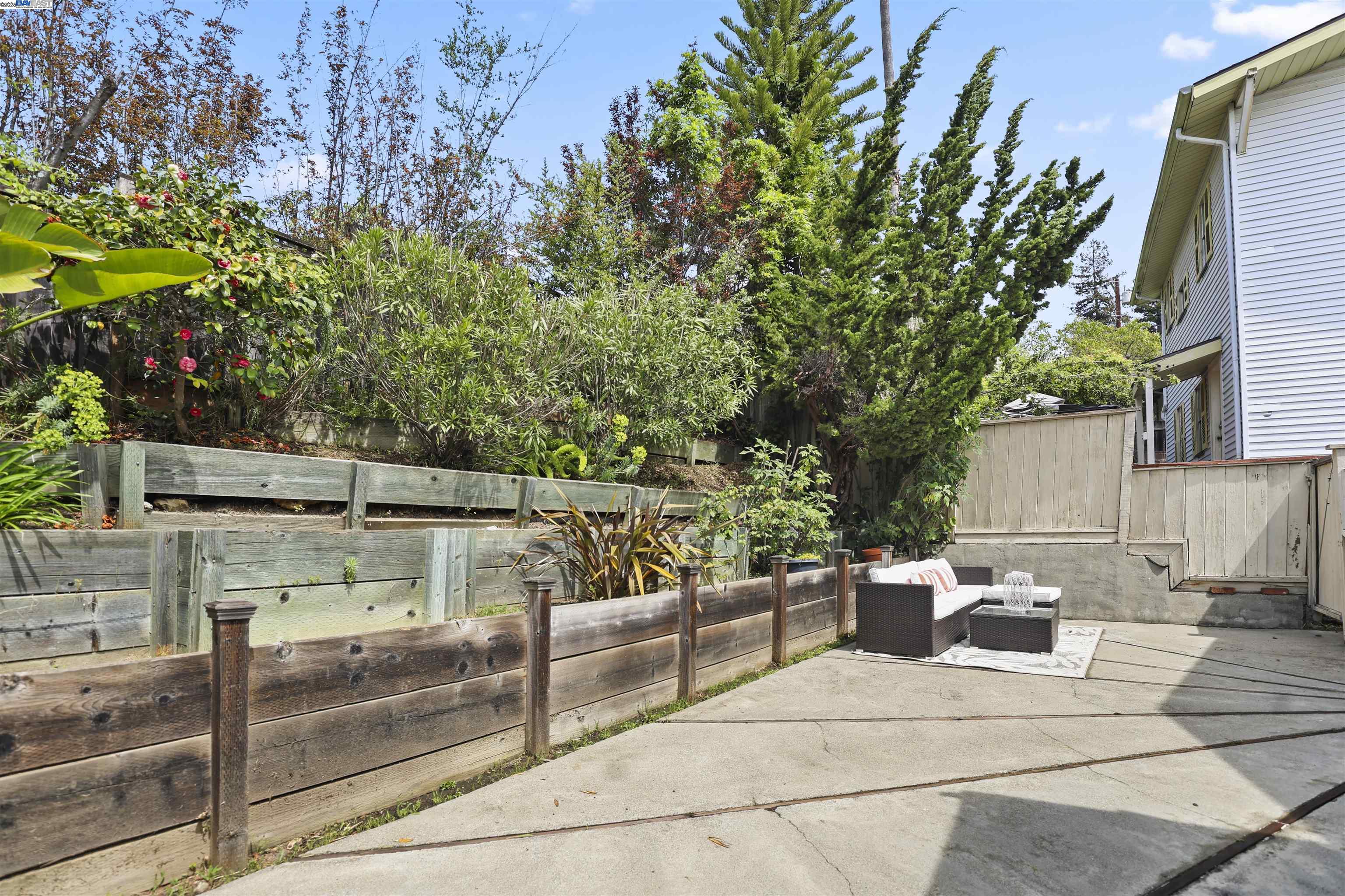 1361 Oakland Avenue Piedmont, CA 94611 - Photo 24 of 27 a view of a terrace with chairs and potted plants