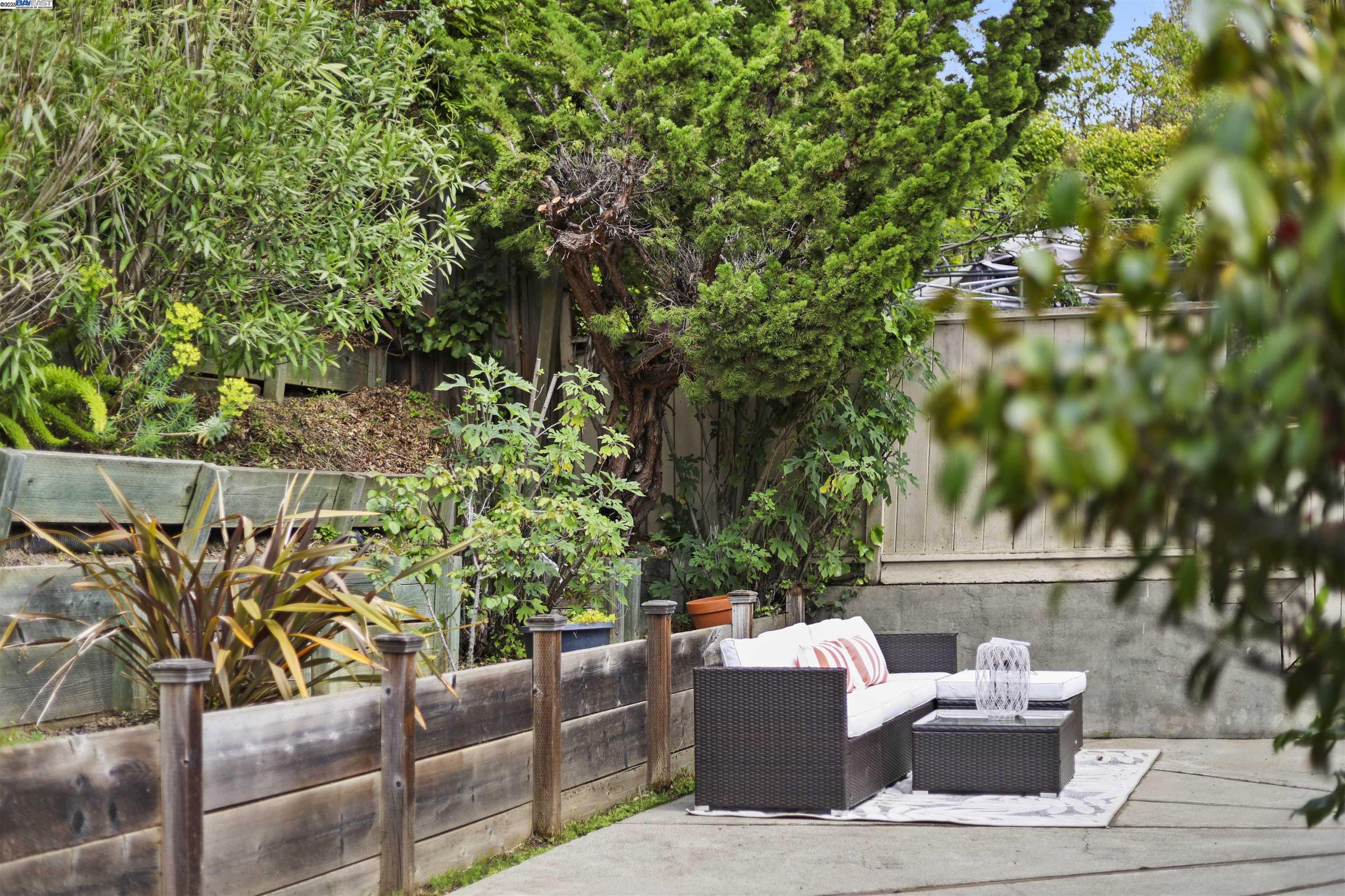 1361 Oakland Avenue Piedmont, CA 94611 - Photo 27 of 27 a outdoor living space with furniture and flowers