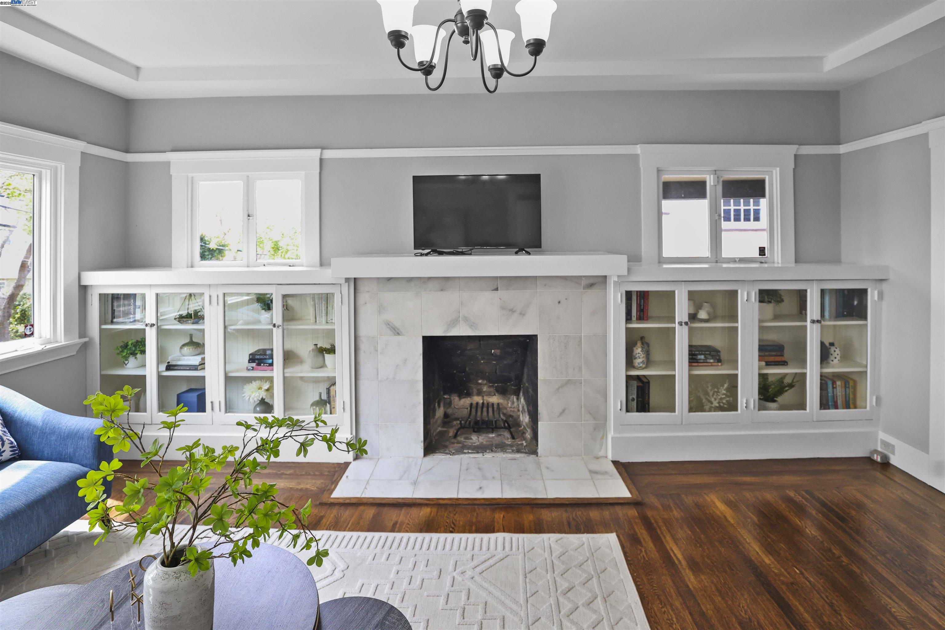 1361 Oakland Avenue Piedmont, CA 94611 - Photo 7 of 27 a living room with furniture fireplace and window