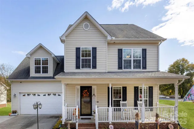 a front view of a house with glass windows