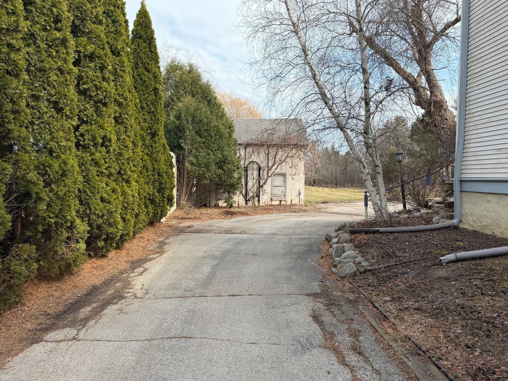 11004 North Range Line Road Mequon, WI 53092 - Photo 3 of 7 DRIVEWAY AND SHED