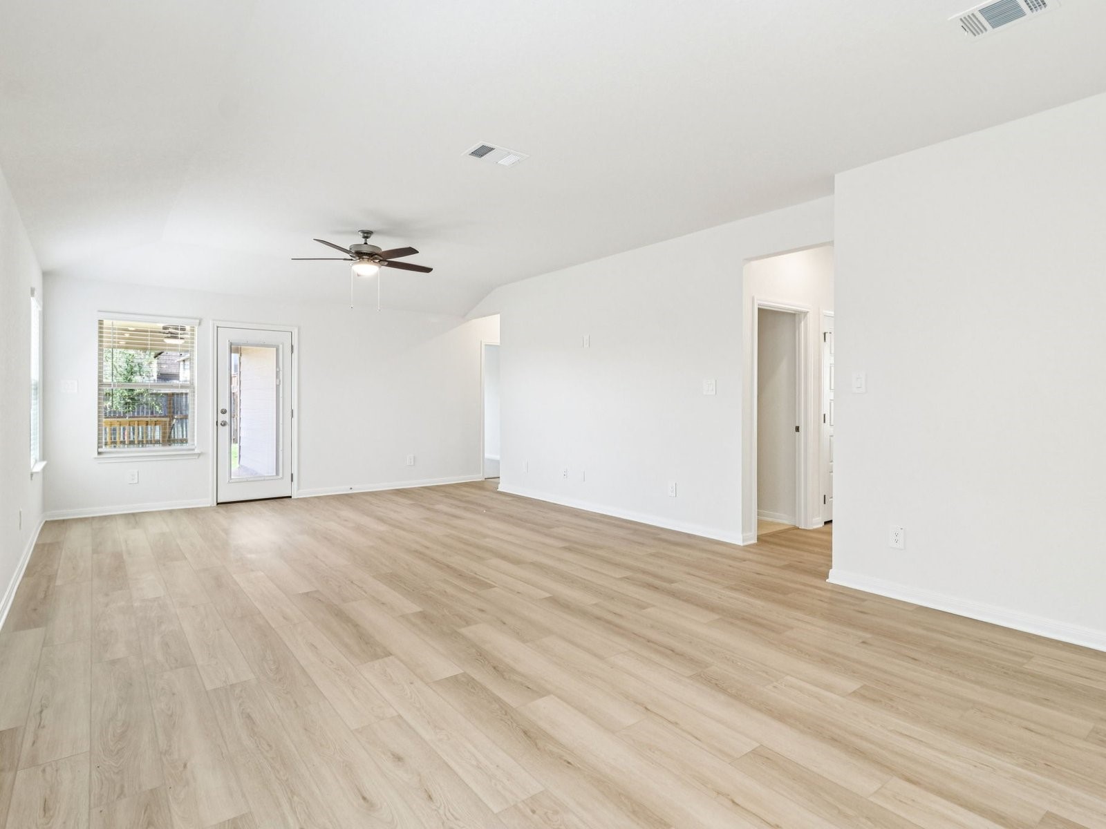 16258 Parish Pointe Court Conroe, TX 77302 - Photo 4 of 10 wooden floor in an empty room