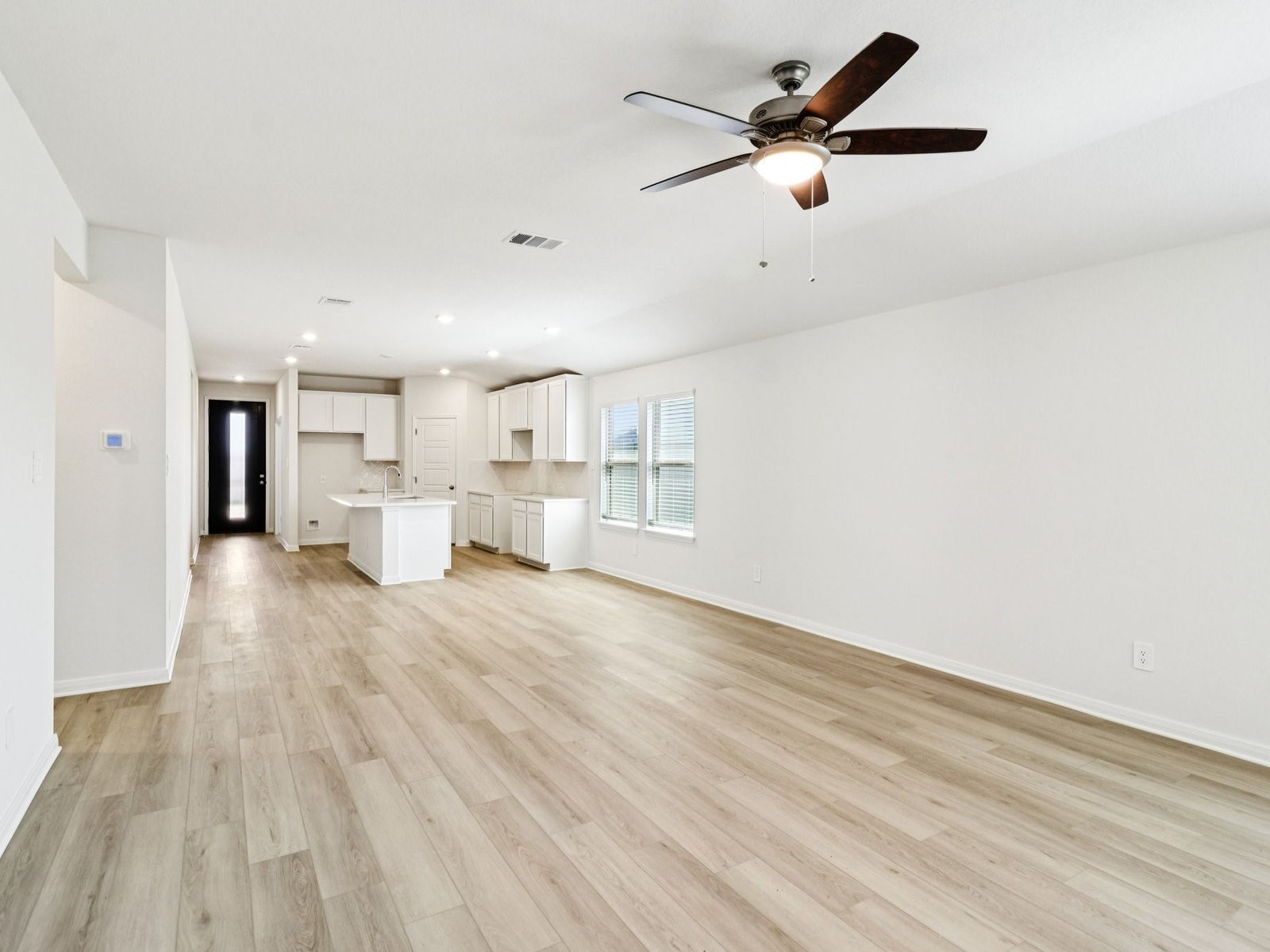 16258 Parish Pointe Court Conroe, TX 77302 - Photo 6 of 10 a view of empty room with wooden floor