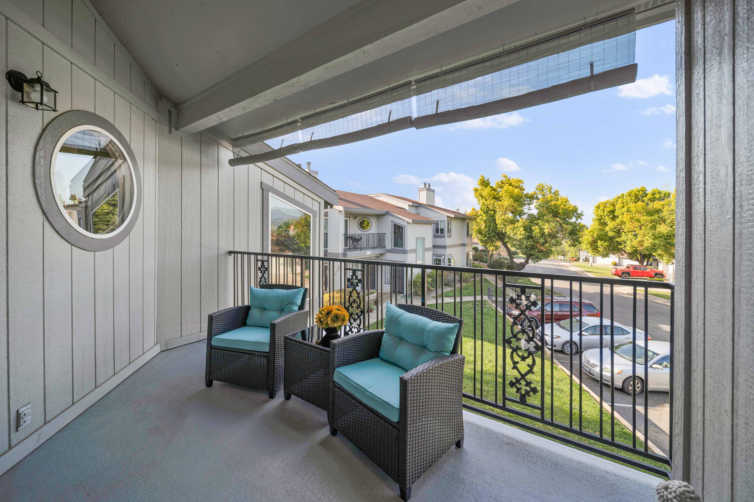 249 Ridgetop Drive, Unit 239 Redding, CA 96003 - Photo 16 of 31 a view of a chairs in the balcony