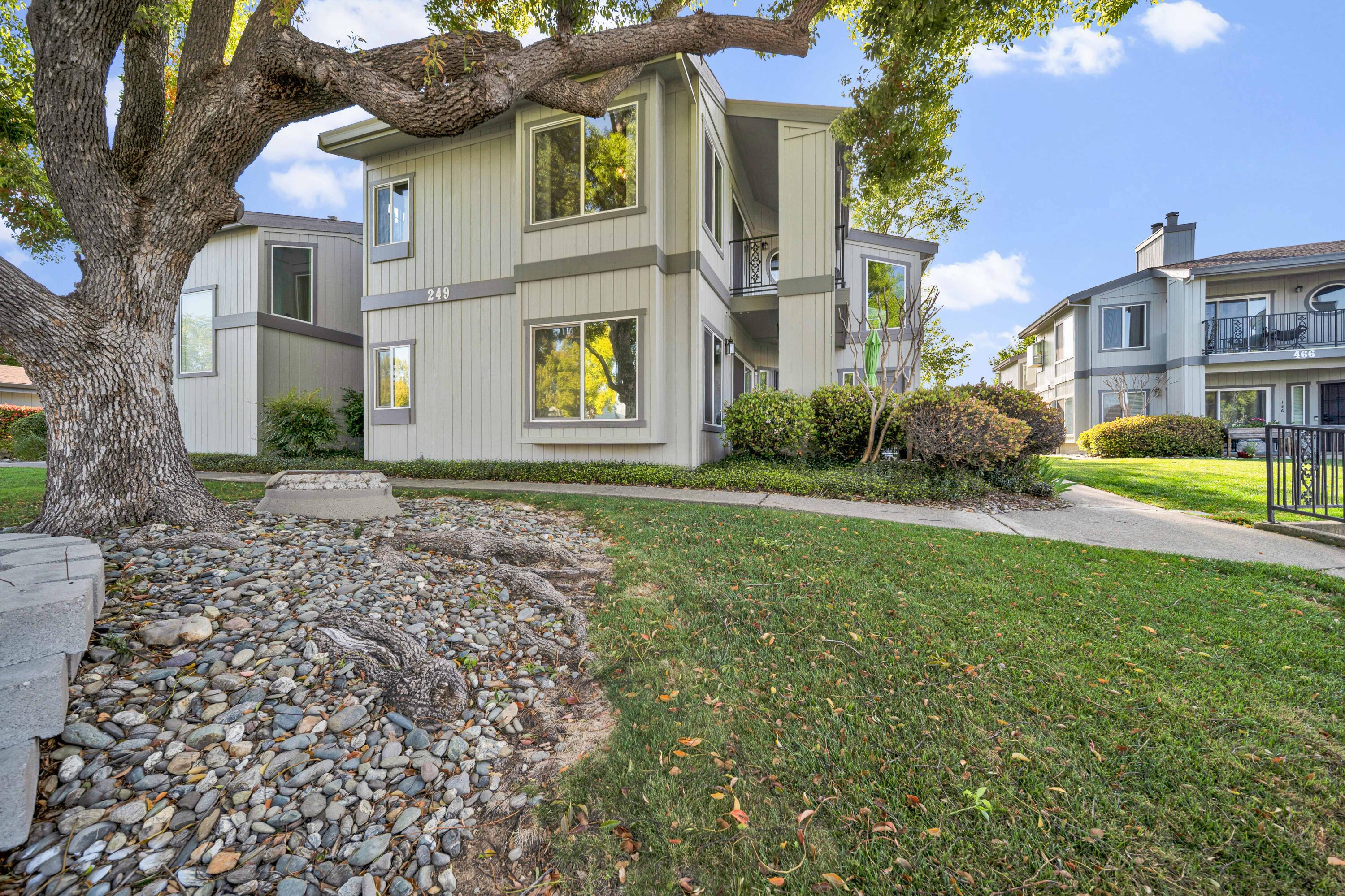 249 Ridgetop Drive, Unit 239 Redding, CA 96003 - Photo 28 of 31 a view of a house with a yard