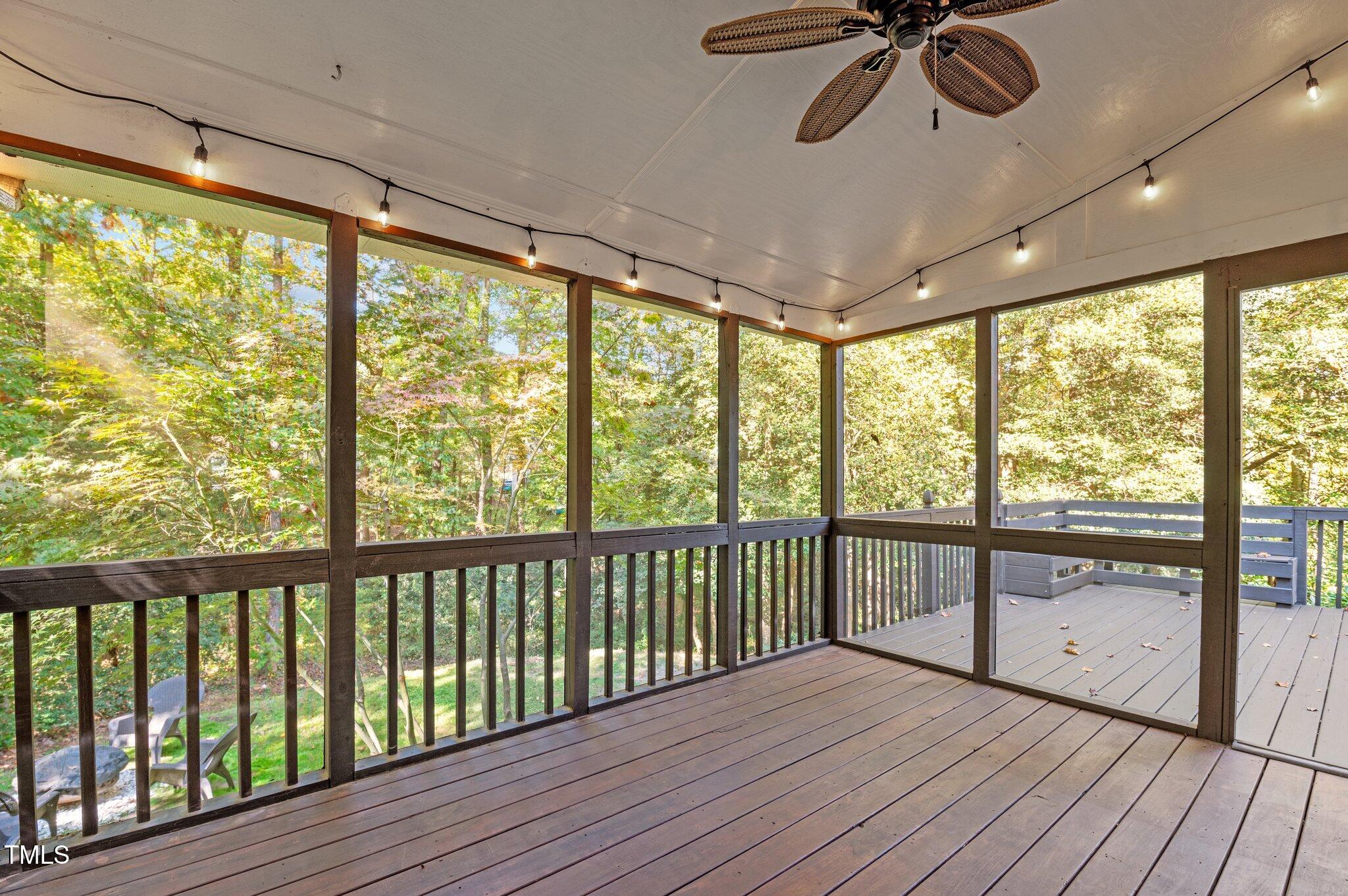 6209 Brielson Place Raleigh, NC 27616 - Photo 30 of 41 a view of empty room with wooden floor and fan