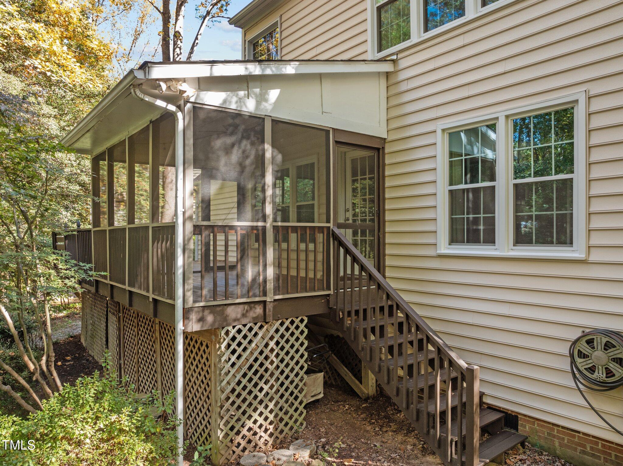 6209 Brielson Place Raleigh, NC 27616 - Photo 33 of 41 a view of a balcony with a potted plant