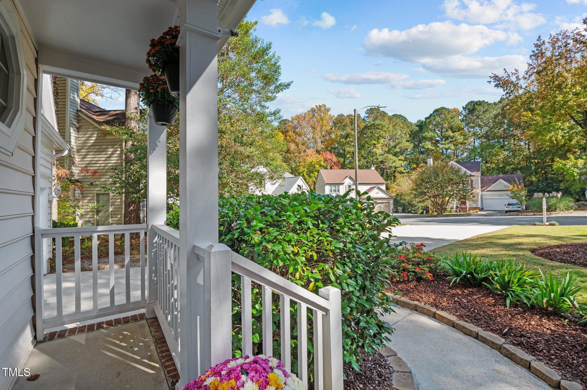 6209 Brielson Place Raleigh, NC 27616 - Photo 4 of 41 a view of a porch with a yard