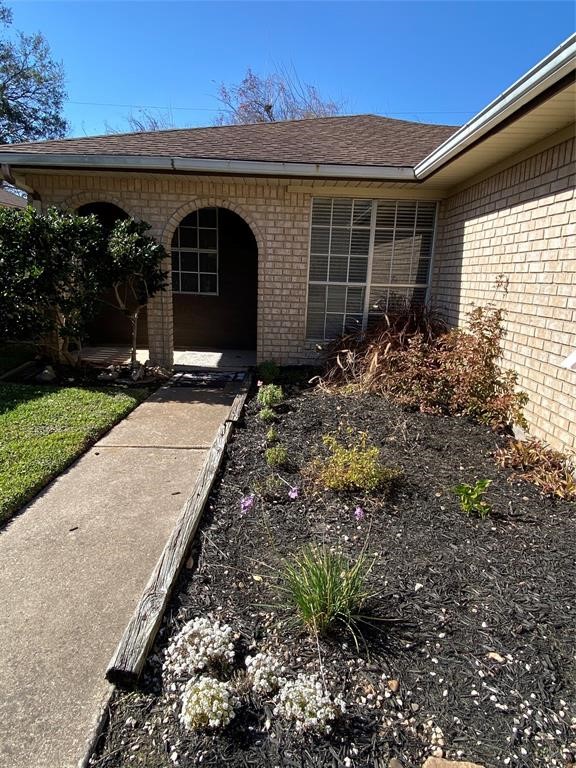 4714 Geraldine Street Pasadena, TX 77586 - Photo 1 of 11 a front view of a house with garden