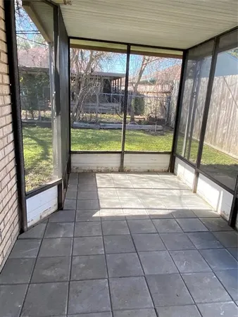 a view of a garden area with an empty room