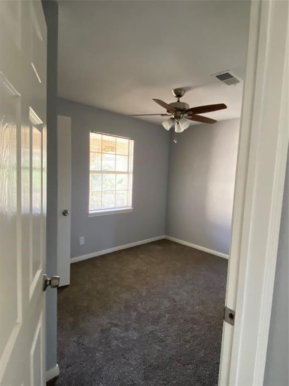 4714 Geraldine Street Pasadena, TX 77586 - Photo 10 of 11 a view of a livingroom with a ceiling fan and window