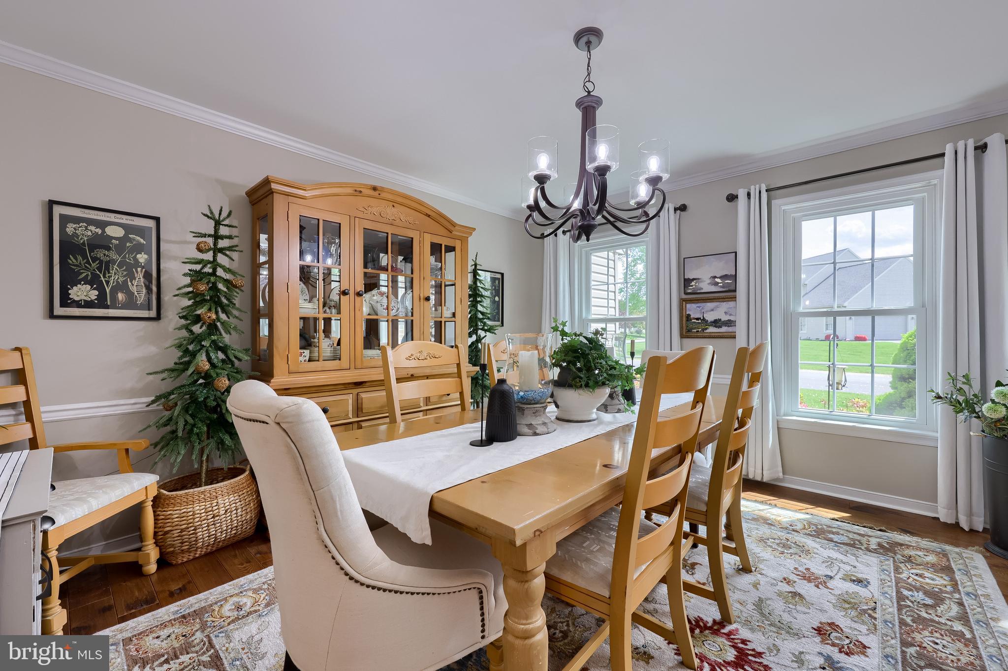 315 Royal Hunt Way Lititz, PA 17543 - Photo 14 of 67 a dining room with furniture a chandelier and wooden floor
