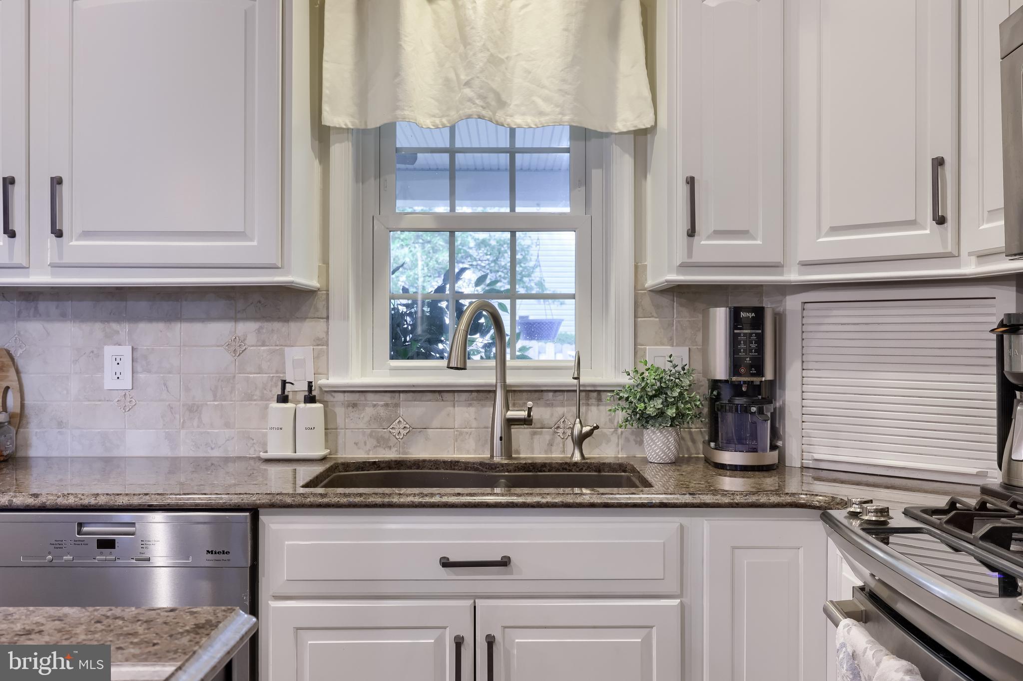 315 Royal Hunt Way Lititz, PA 17543 - Photo 19 of 67 a kitchen with stainless steel appliances granite countertop a sink a stove and a granite counter tops