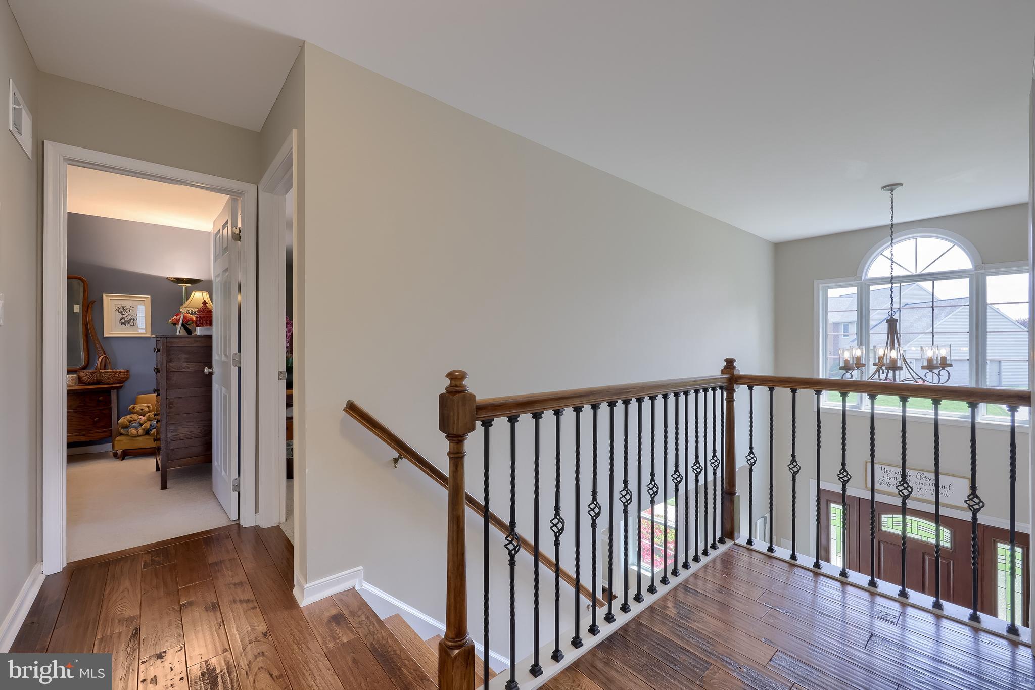 315 Royal Hunt Way Lititz, PA 17543 - Photo 31 of 67 a view of hallway with wooden floor and a livingroom