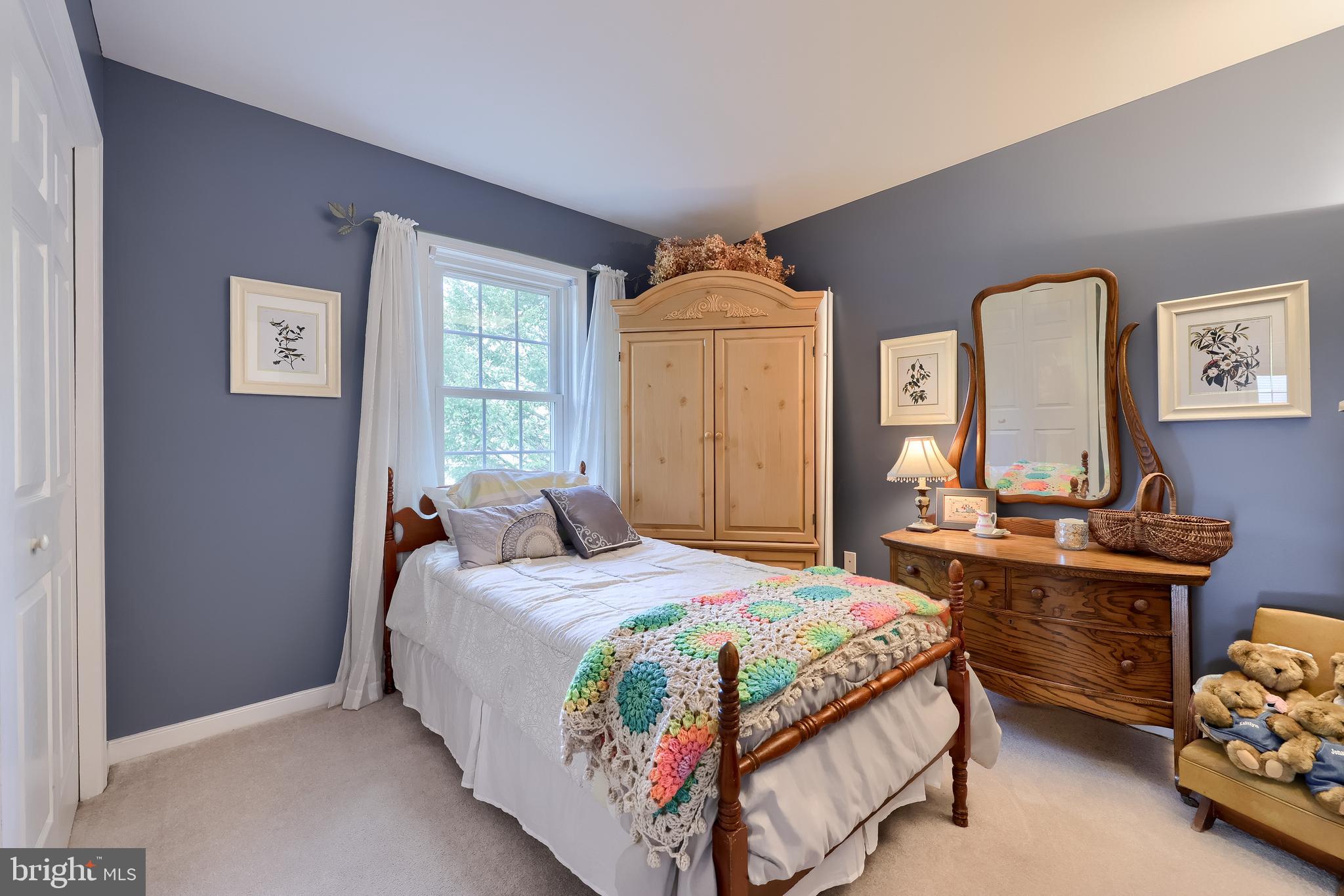 315 Royal Hunt Way Lititz, PA 17543 - Photo 41 of 67 a bedroom with a bed and a dresser in it