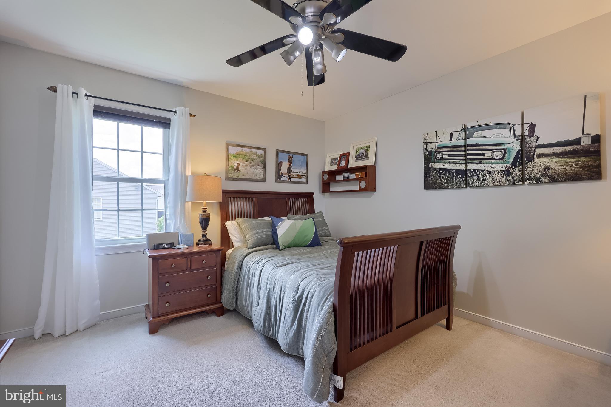 315 Royal Hunt Way Lititz, PA 17543 - Photo 42 of 67 a bedroom with a bed dresser and a window