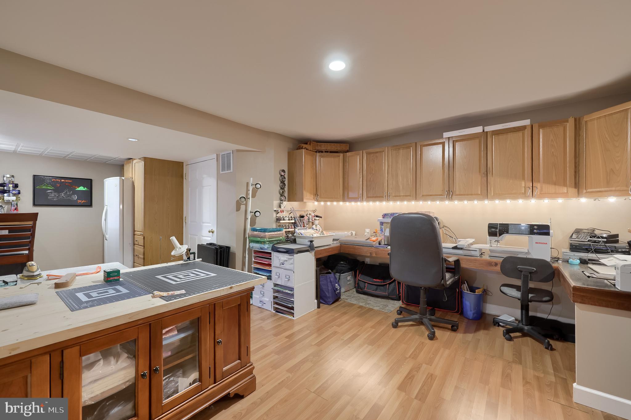 315 Royal Hunt Way Lititz, PA 17543 - Photo 46 of 67 a open kitchen with stainless steel appliances granite countertop a stove top oven a sink dishwasher and cabinets with wooden floor