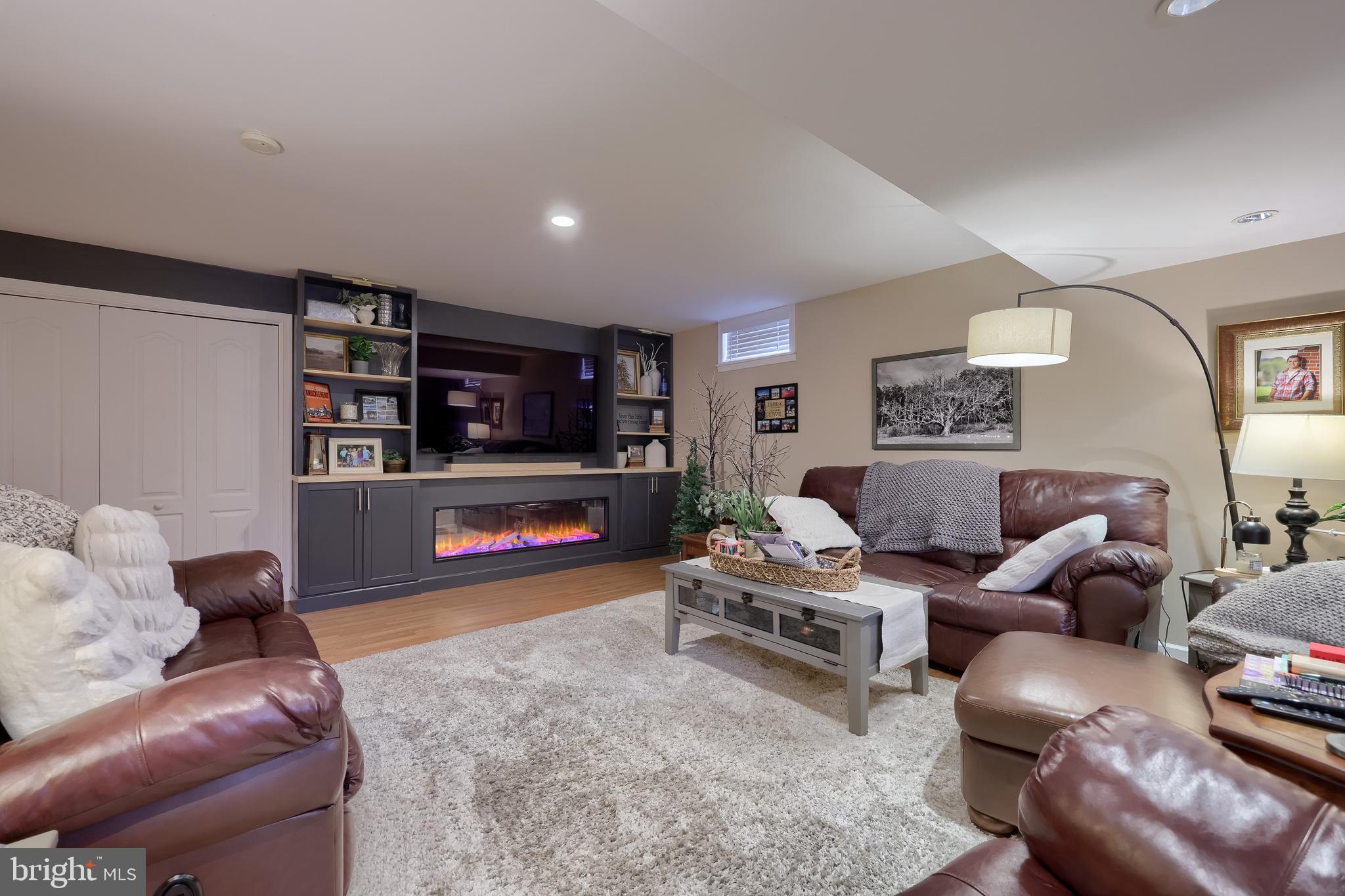 315 Royal Hunt Way Lititz, PA 17543 - Photo 52 of 67 a living room with furniture and a flat screen tv