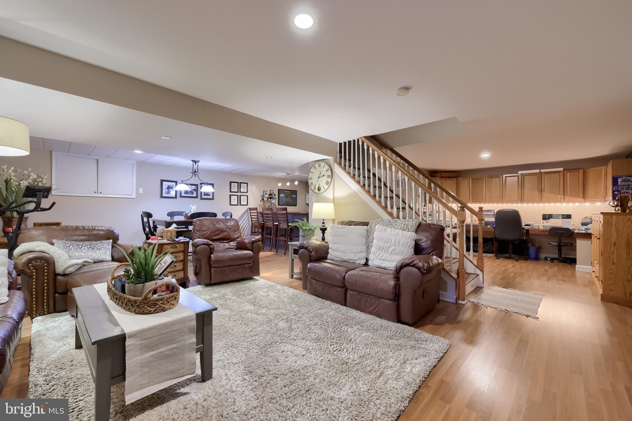 315 Royal Hunt Way Lititz, PA 17543 - Photo 54 of 67 a living room with lots of furniture and kitchen view