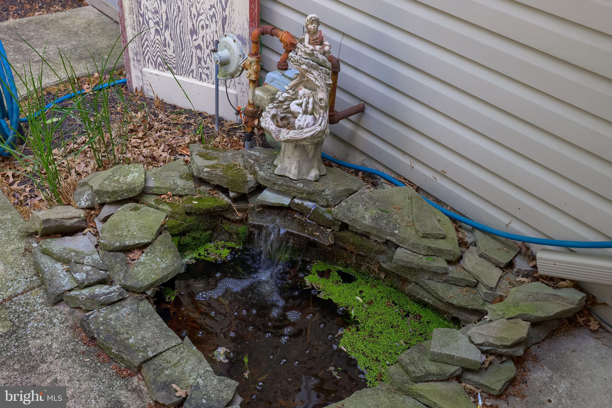 315 Royal Hunt Way Lititz, PA 17543 - Photo 57 of 67 a backyard of a house with a large tree