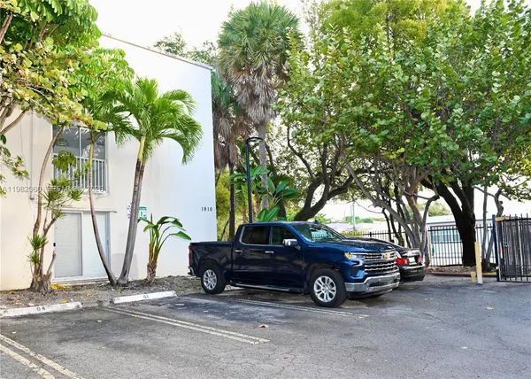 a view of car parked in a parking