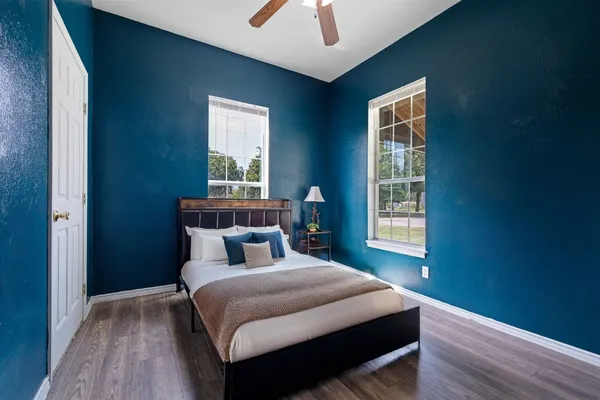 a bathroom with a sink a vanity and a mirror
