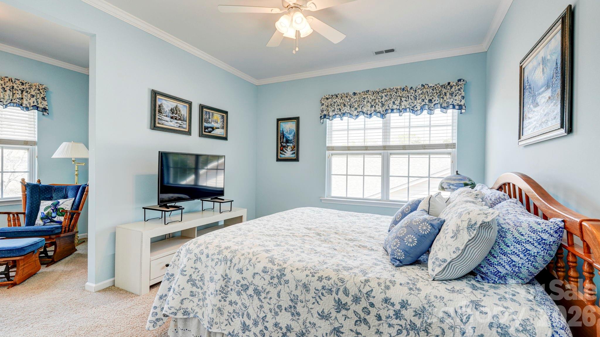 1162 Gold Rush Court Fort Mill, SC 29708 - Photo 15 of 21 a bedroom with a bed and a flat screen tv