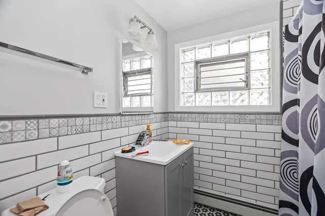 a bathroom with a sink and a shower