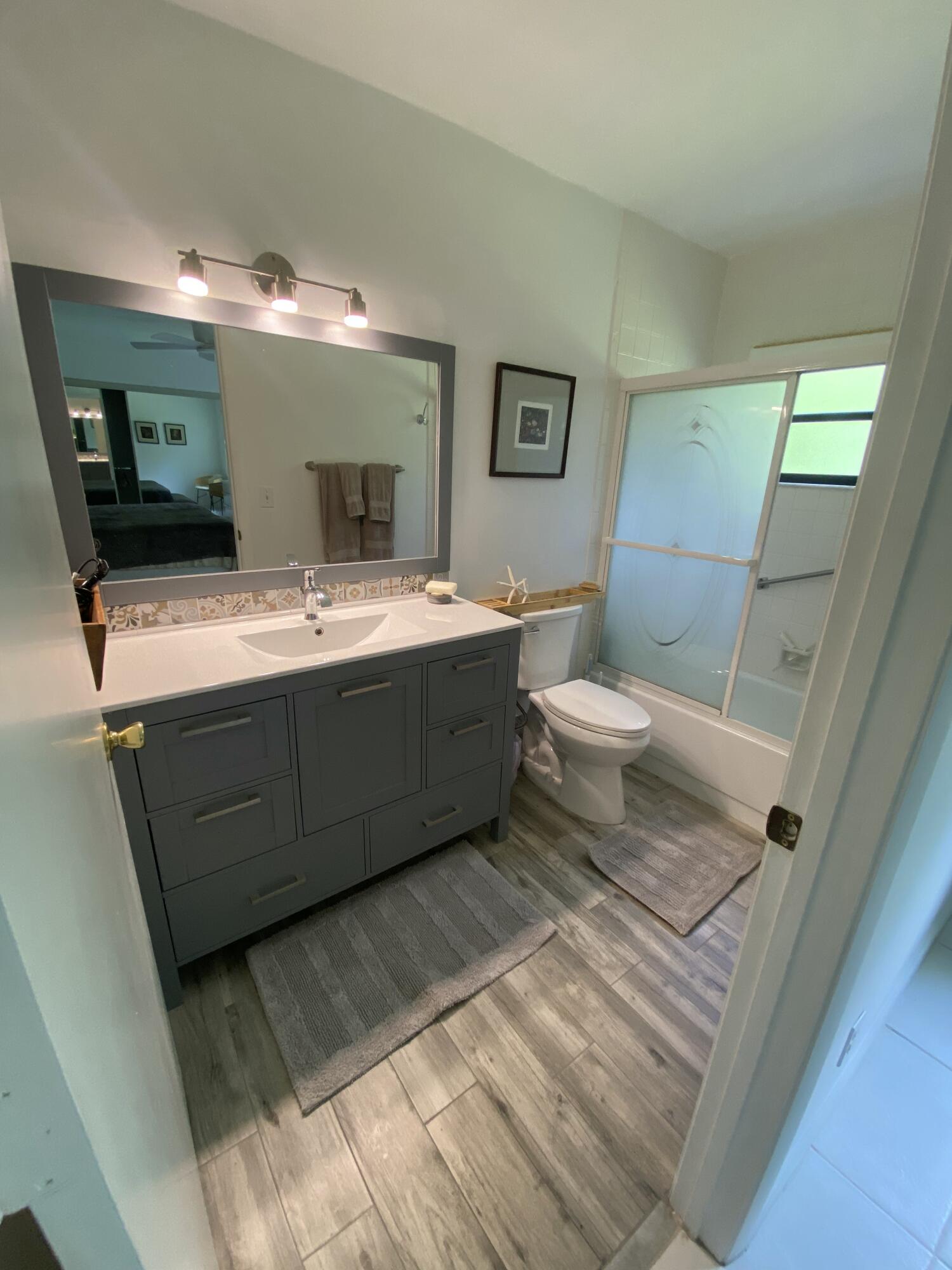 5061 Nesting Way, Unit D Delray Beach, FL 33484 - Photo 3 of 20 IMG_7703