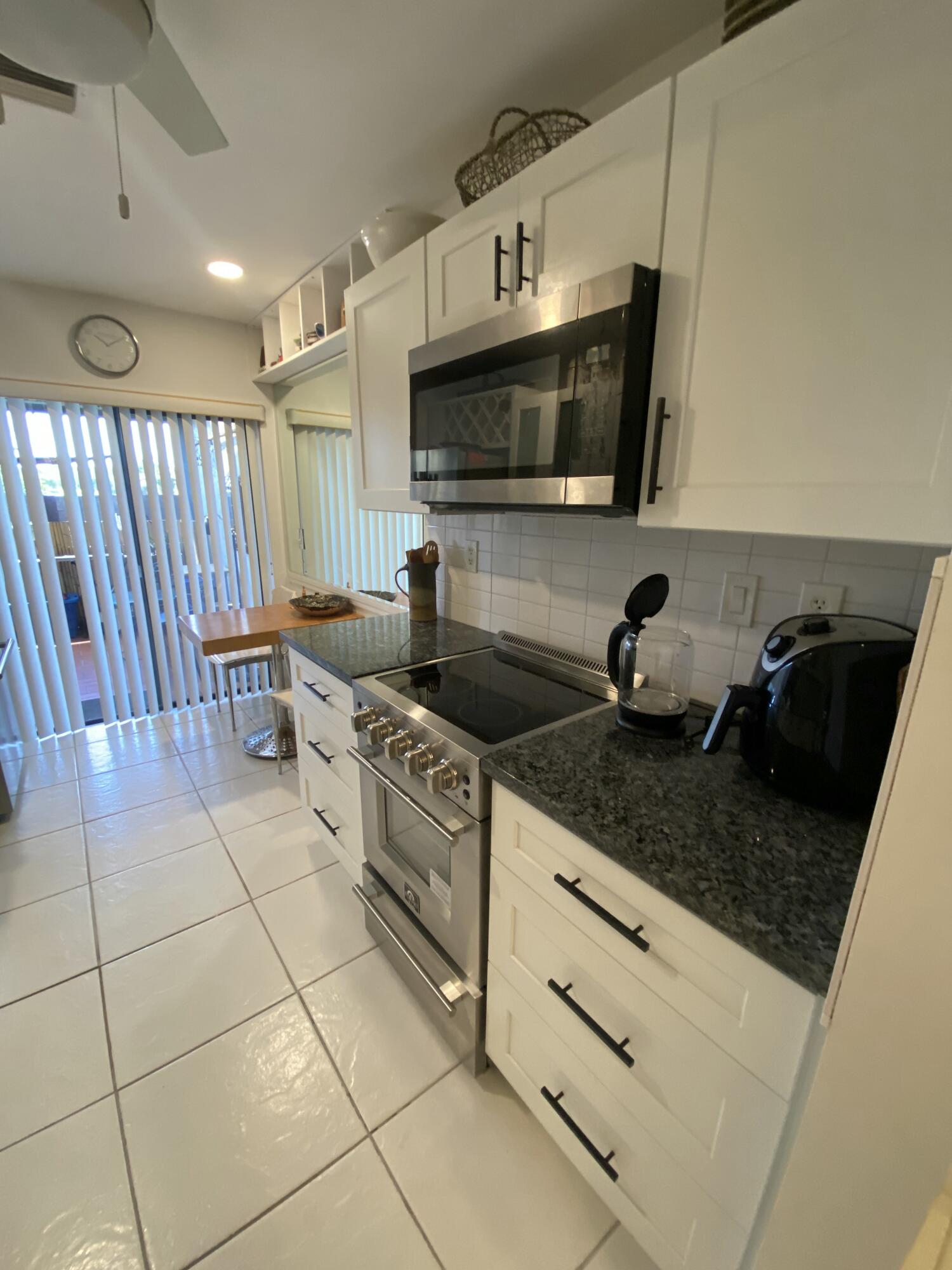 5061 Nesting Way, Unit D Delray Beach, FL 33484 - Photo 8 of 20 IMG_7698