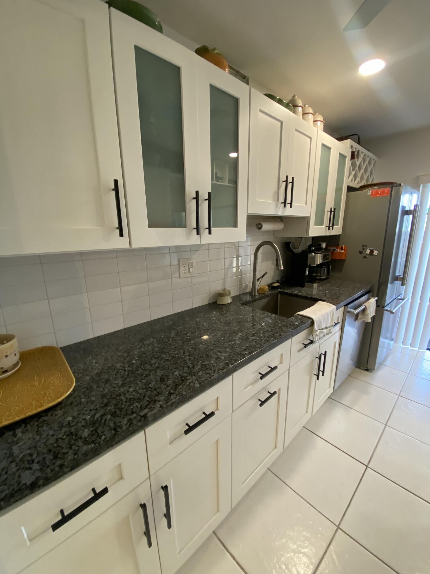 5061 Nesting Way, Unit D Delray Beach, FL 33484 - Photo 9 of 20 IMG_7697