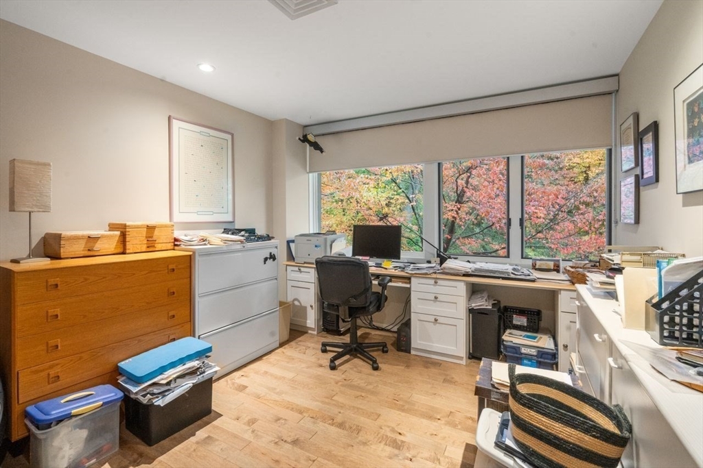 241 Perkins Street, Unit C306 Boston, MA 02130 - Photo 15 of 33 a view of a workspace with furniture and a window