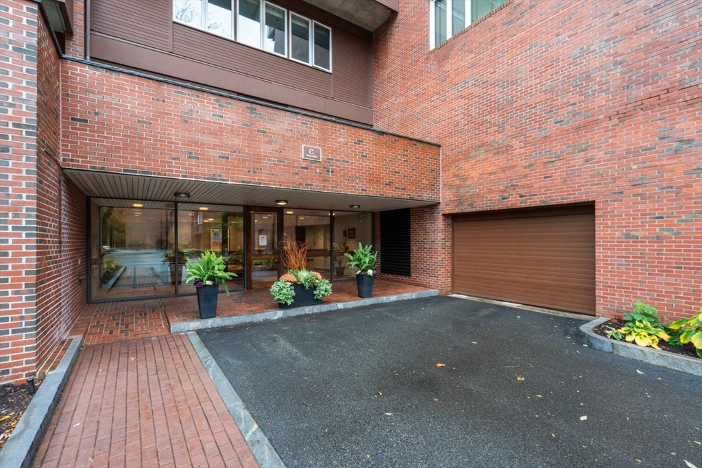 241 Perkins Street, Unit C306 Boston, MA 02130 - Photo 32 of 33 a view of a house with porch and sitting area
