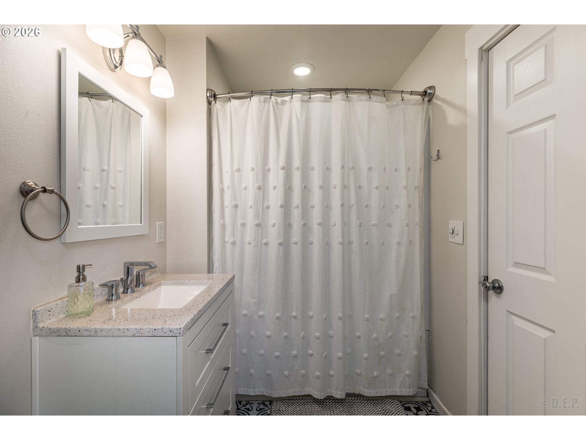 169 North Vernonia Road St. Helens, OR 97051 - Photo 12 of 27 a bathroom with a granite countertop sink a mirror a vanity and a shower