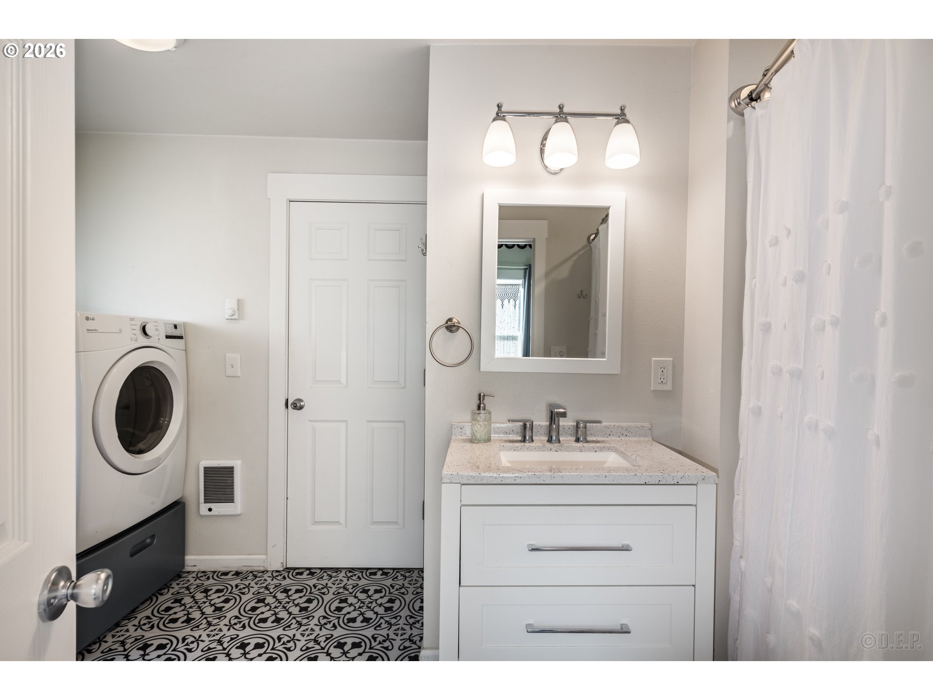 169 North Vernonia Road St. Helens, OR 97051 - Photo 13 of 27 a bathroom with a sink a mirror and vanity