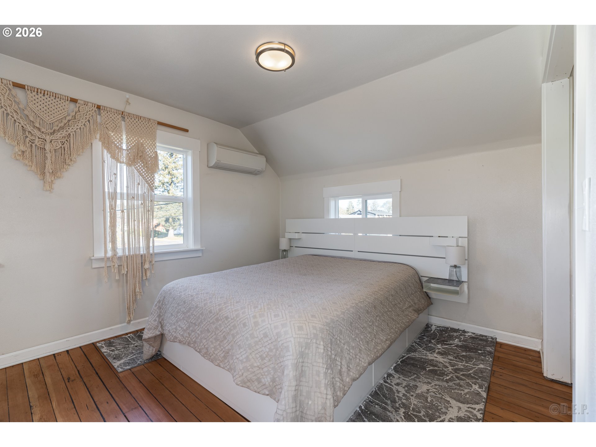 169 North Vernonia Road St. Helens, OR 97051 - Photo 14 of 27 a bedroom with a bed and a window