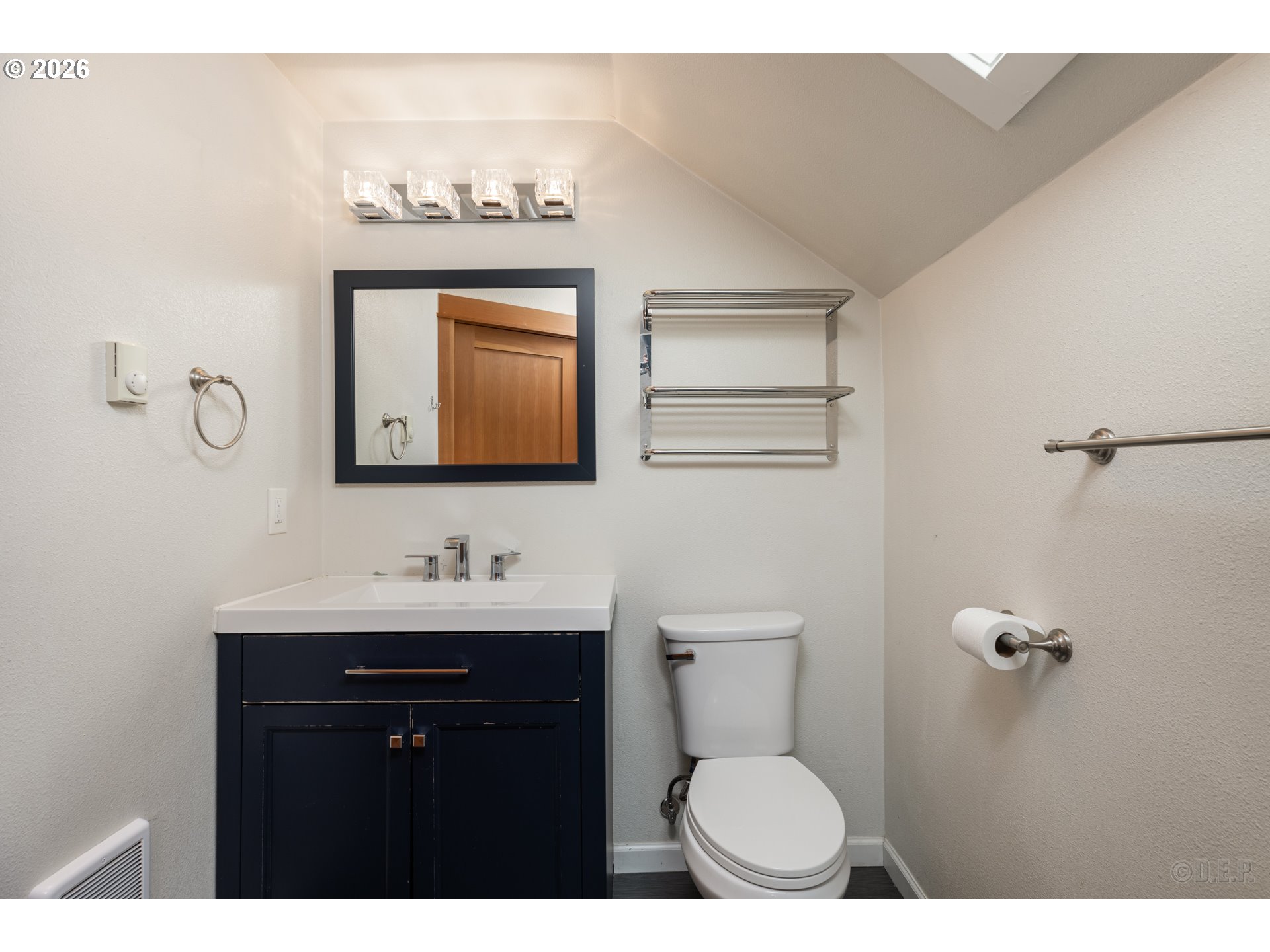 169 North Vernonia Road St. Helens, OR 97051 - Photo 15 of 27 a bathroom with a toilet sink and mirror