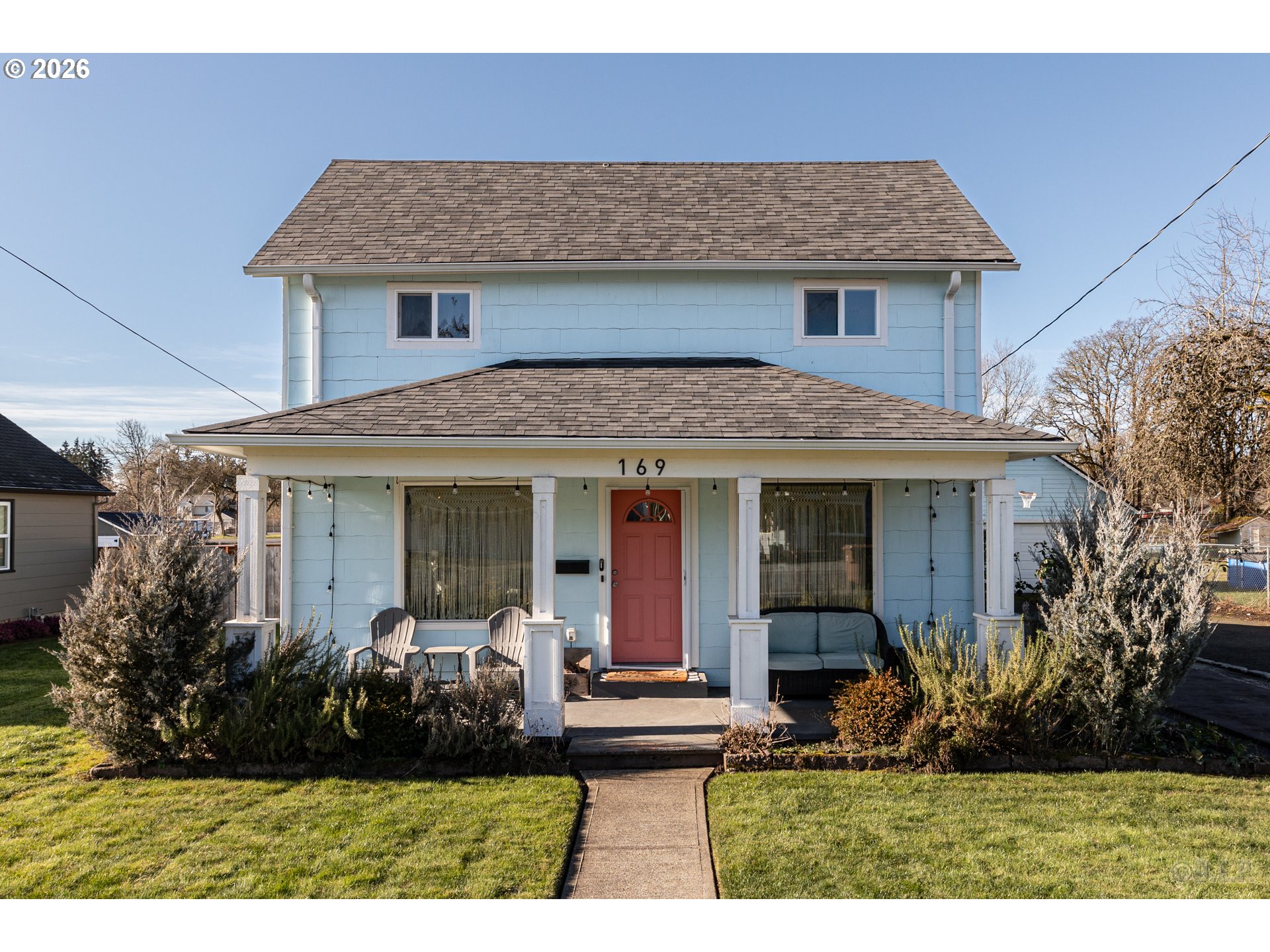 169 North Vernonia Road St. Helens, OR 97051 - Photo 2 of 27 a front view of a house with garden